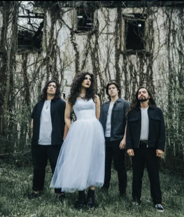 Maggie Rojas and Blaise Rojas of Magdalene Rose in dark performance portraits